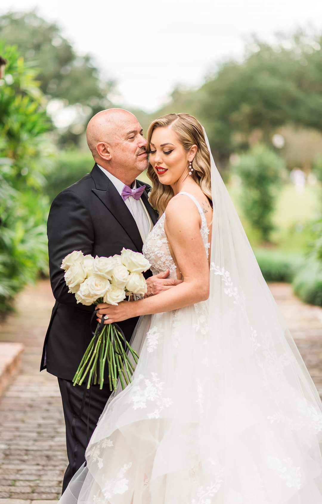 Groom Holding Bride